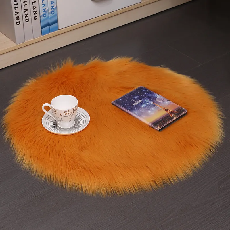 Round beige wool plush carpet floor mat on a wooden floor.