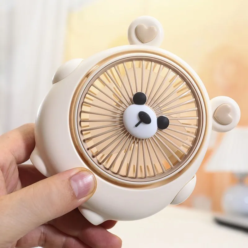USB desktop fan with cute dog design in Bear Brown colour, showing compact size and three speed buttons.