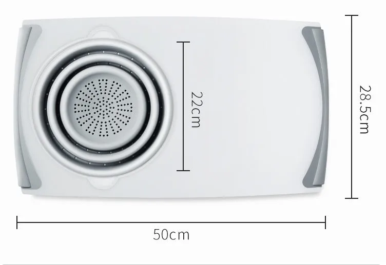 Grey 3-in-1 chopping board with detachable folding drain basket on a kitchen counter.