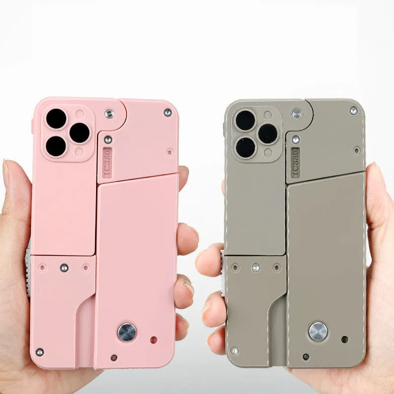 Folding mobile phone toy dart blaster in pink showing double barrels and safe EVA foam bullets