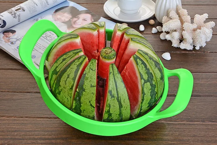 Green plastic melon slicer with stainless steel blades cutting a watermelon into wedges.