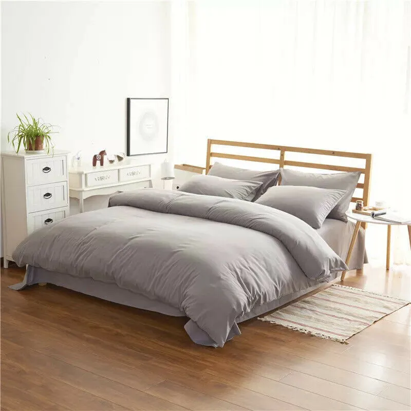 Four-piece polyester bedding set in a modern style for a 2m bed, shown in a choice of colours.