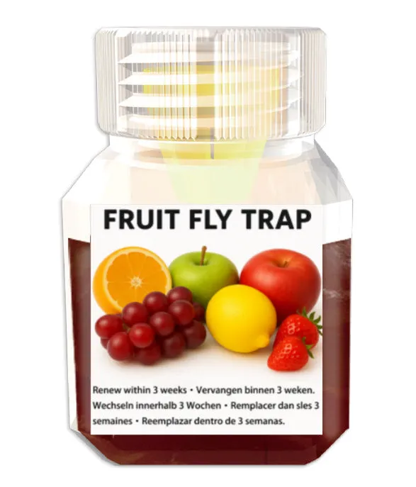 Bottle of SK003 fruit fly trapper bait liquid on a kitchen counter.