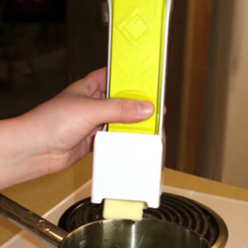 Yellow butter cutter with stainless steel blades for portioning standard butter bars