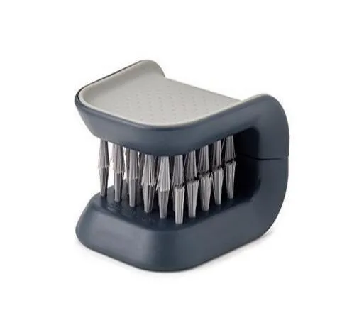 Blue U-shaped plastic brush for cleaning knives and forks in kitchen sink