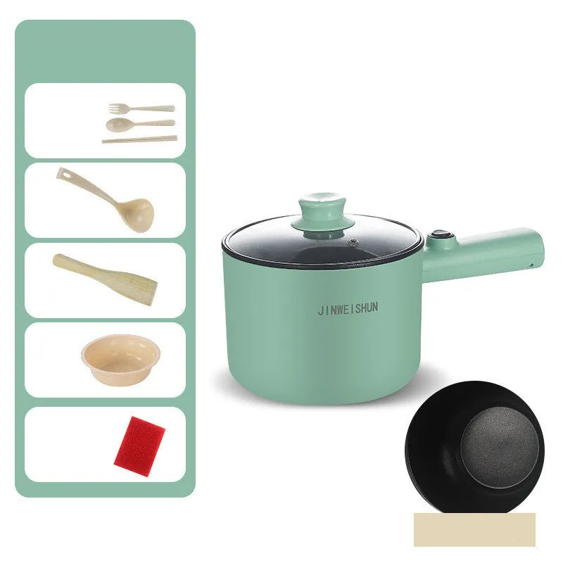 Compact white electric multi-function hot pot with non-stick interior on a kitchen countertop