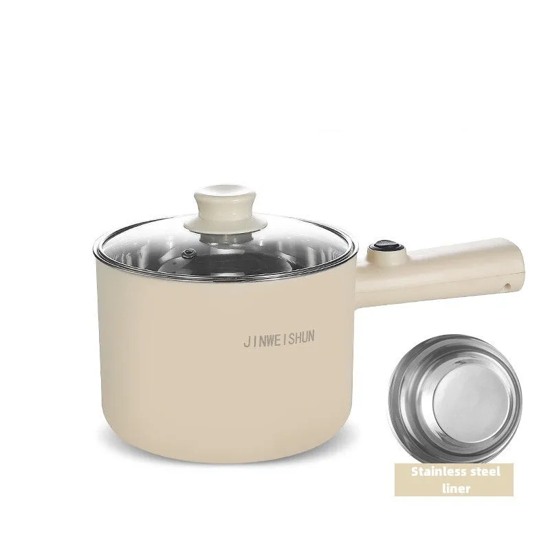 Compact white electric multi-function hot pot with non-stick interior on a kitchen countertop
