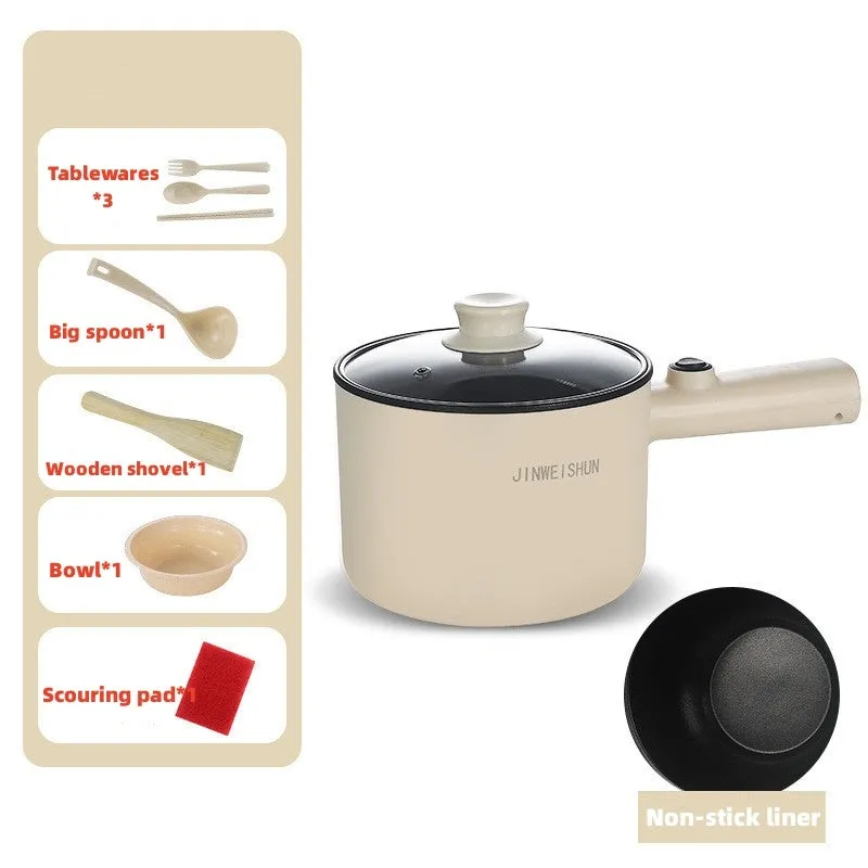 Compact white electric multi-function hot pot with non-stick interior on a kitchen countertop