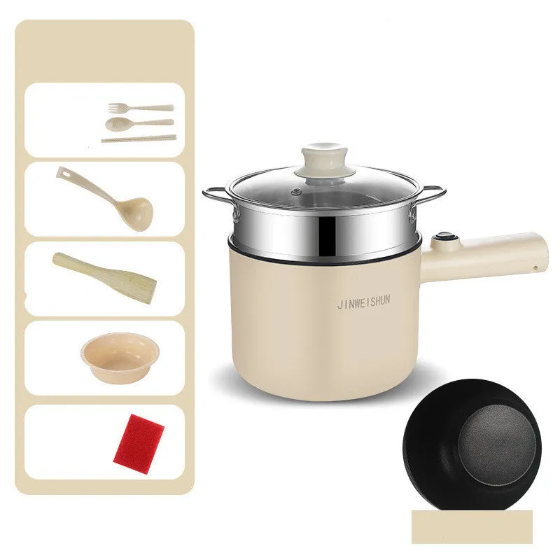 Compact white electric multi-function hot pot with non-stick interior on a kitchen countertop