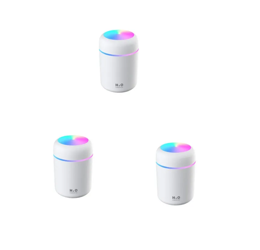 Pink car USB humidifier with LED lights showing water tank and control button