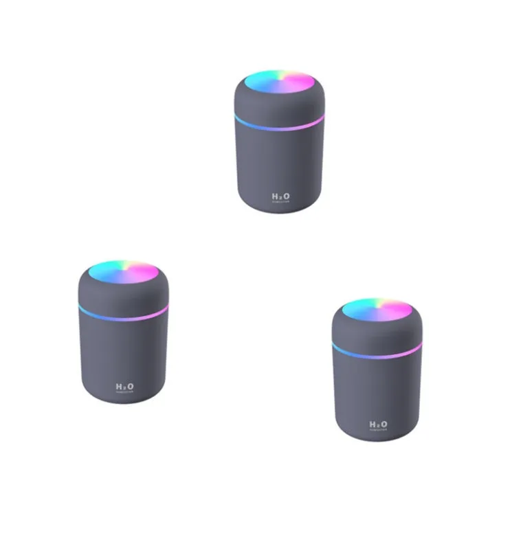 Pink car USB humidifier with LED lights showing water tank and control button