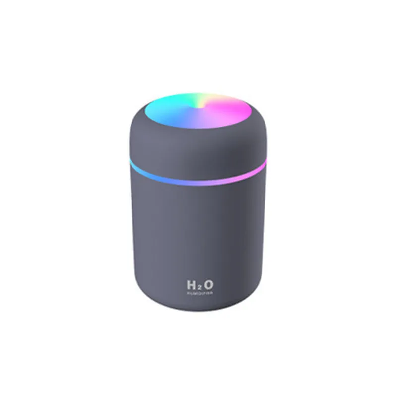 Pink car USB humidifier with LED lights showing water tank and control button