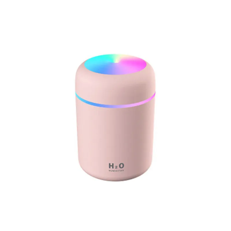 Pink car USB humidifier with LED lights showing water tank and control button