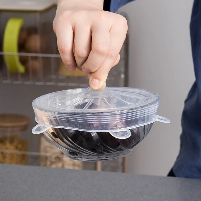 Set of six colourful silicone stretch lids in different sizes for covering bowls and food containers.