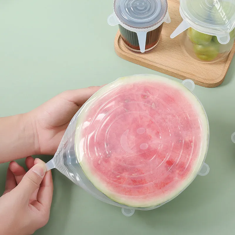 Set of six colourful silicone stretch lids in different sizes for covering bowls and food containers.