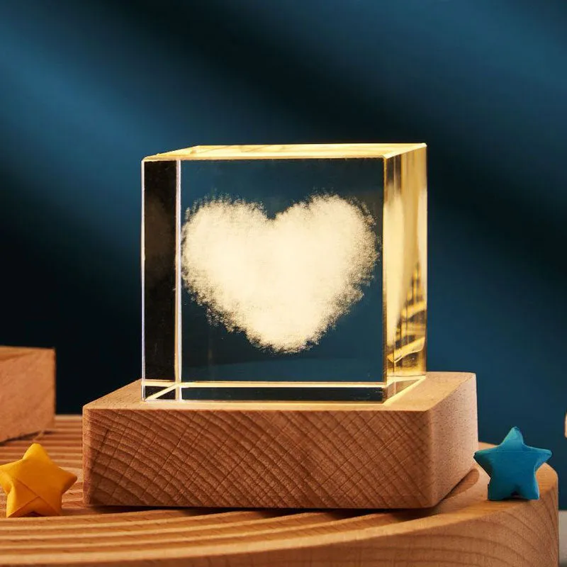 3D transparent crystal cube night lamp in 40mm or 60mm size on a desktop