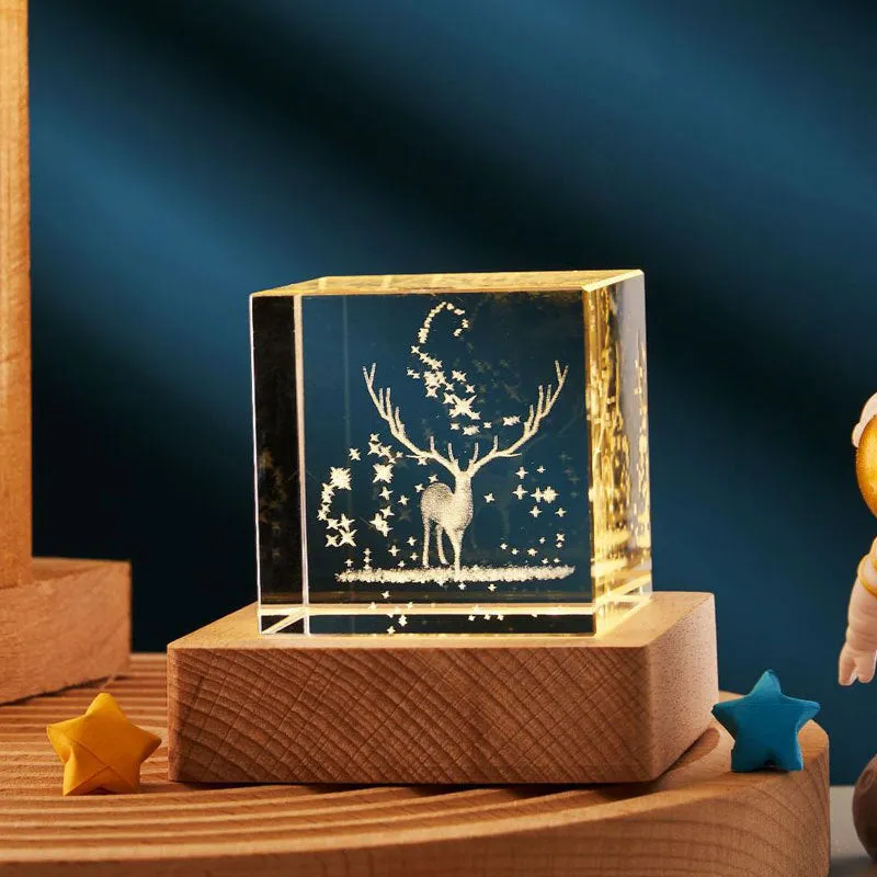 3D transparent crystal cube night lamp in 40mm or 60mm size on a desktop