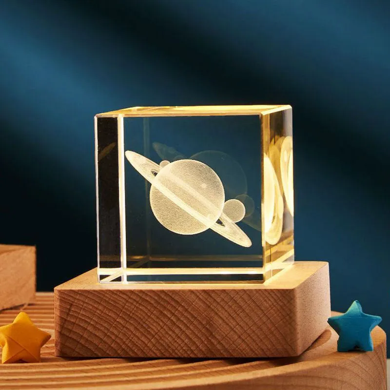 3D transparent crystal cube night lamp in 40mm or 60mm size on a desktop