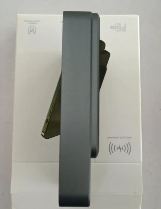 MagSafe magnetic wireless power bank for iPhone 14 in purple, showing slim profile and square aluminium alloy design.