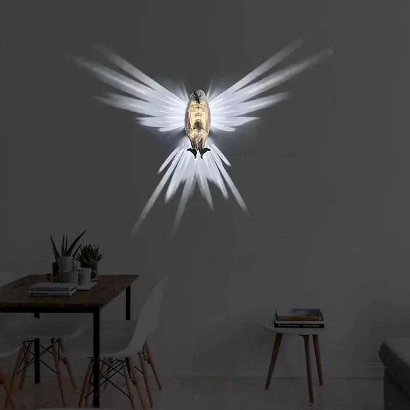 3D printed eagle-shaped resin wall lamp projecting a bird silhouette pattern on a wall
