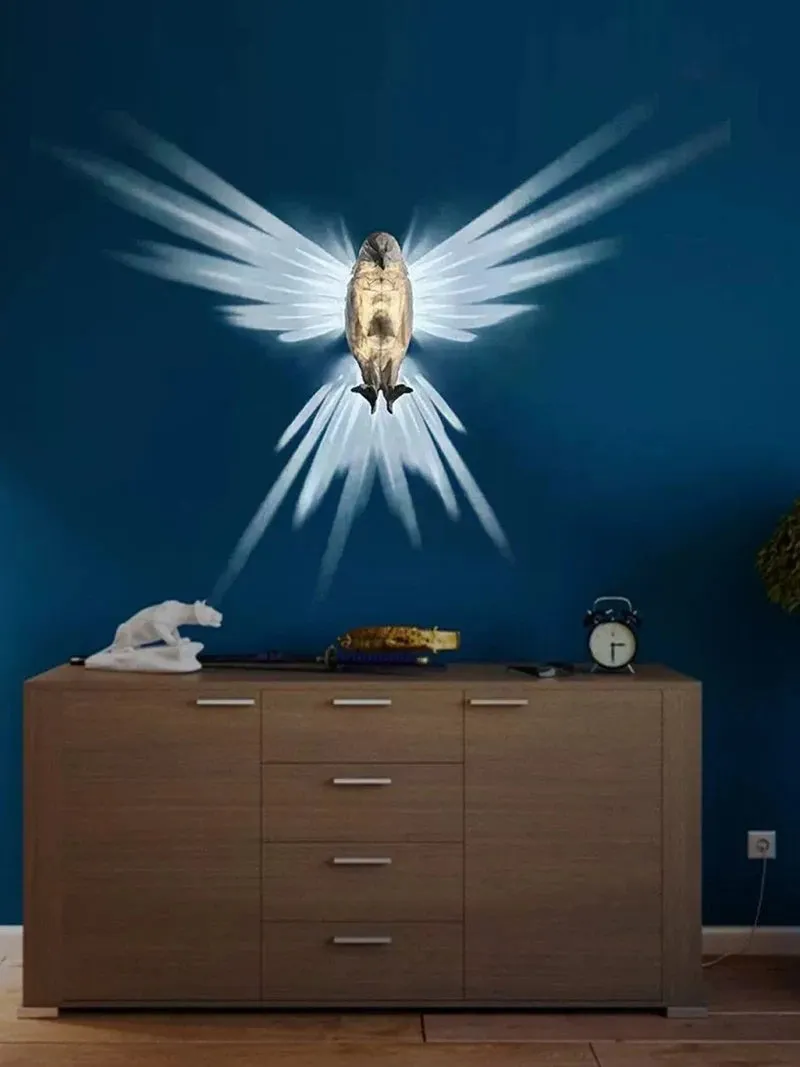 3D printed eagle-shaped resin wall lamp projecting a bird silhouette pattern on a wall