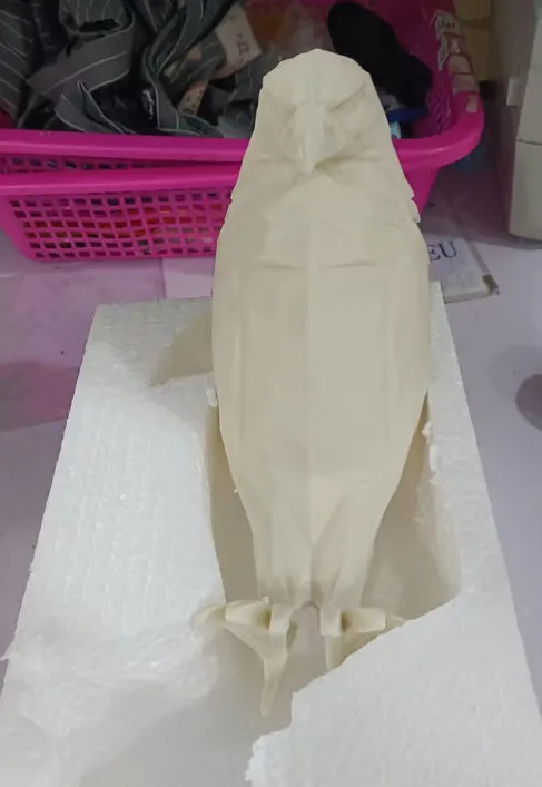 3D printed eagle-shaped resin wall lamp projecting a bird silhouette pattern on a wall