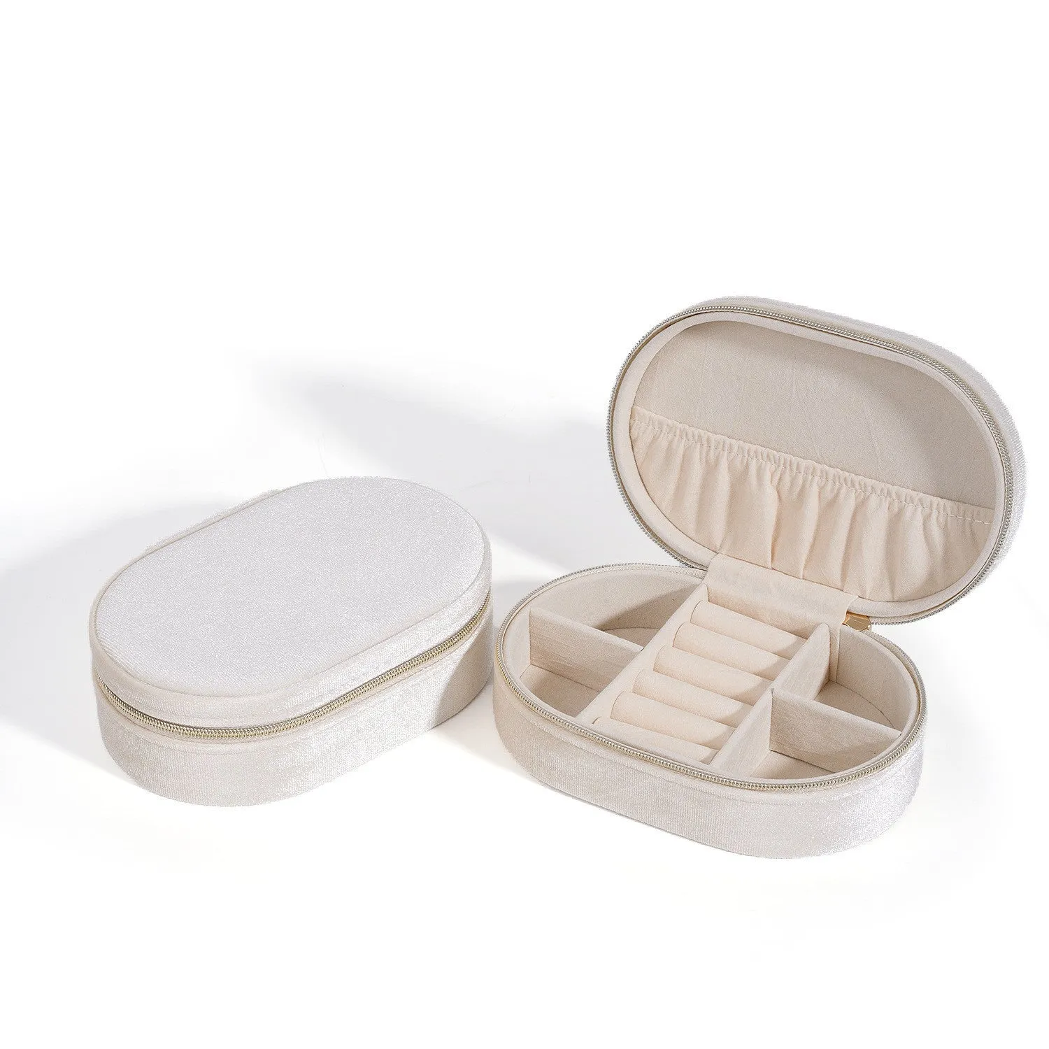 Oval velvet jewellery storage box in lake blue with internal hook for necklaces.