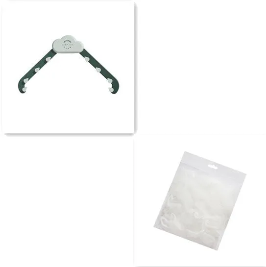 Green triangular ABS plastic sink drain rack with elastic mesh filter net installed in kitchen sink corner.