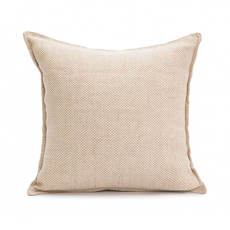 Red coffee brown square cushion with PP cotton filler on a grey sofa.