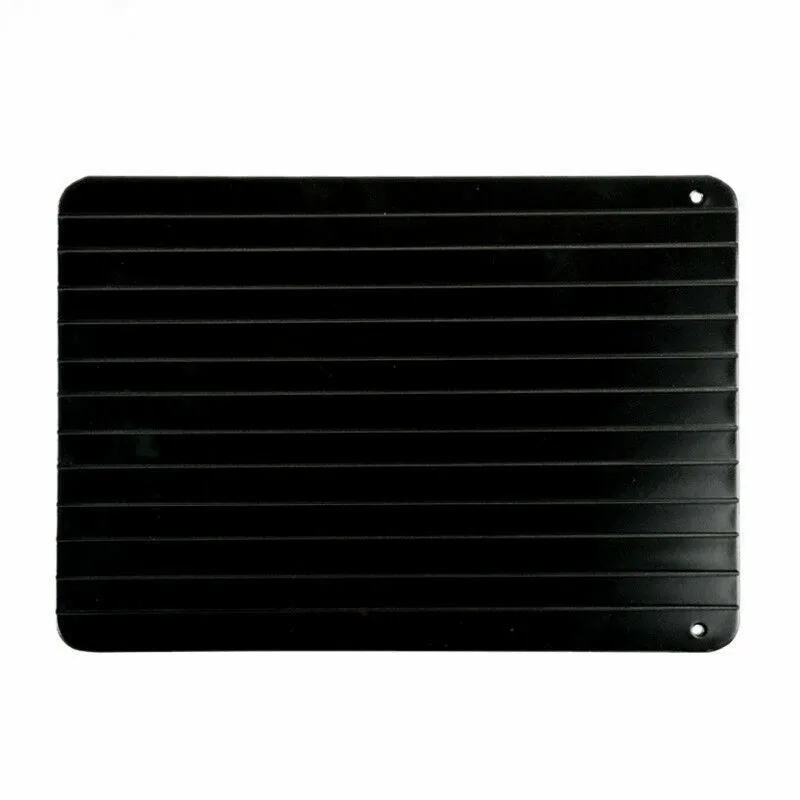 Black rectangular aluminium fast defrost tray for thawing frozen meat and food without electricity.