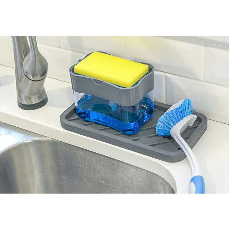 Rectangular grey plastic kitchen soap dispenser with a touch-free pump on a worktop.