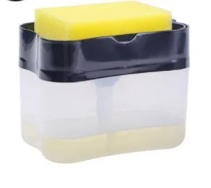 Rectangular grey plastic kitchen soap dispenser with a touch-free pump on a worktop.