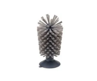 Grey kitchen cleaning brush with two brush heads and suction cups for wall mounting