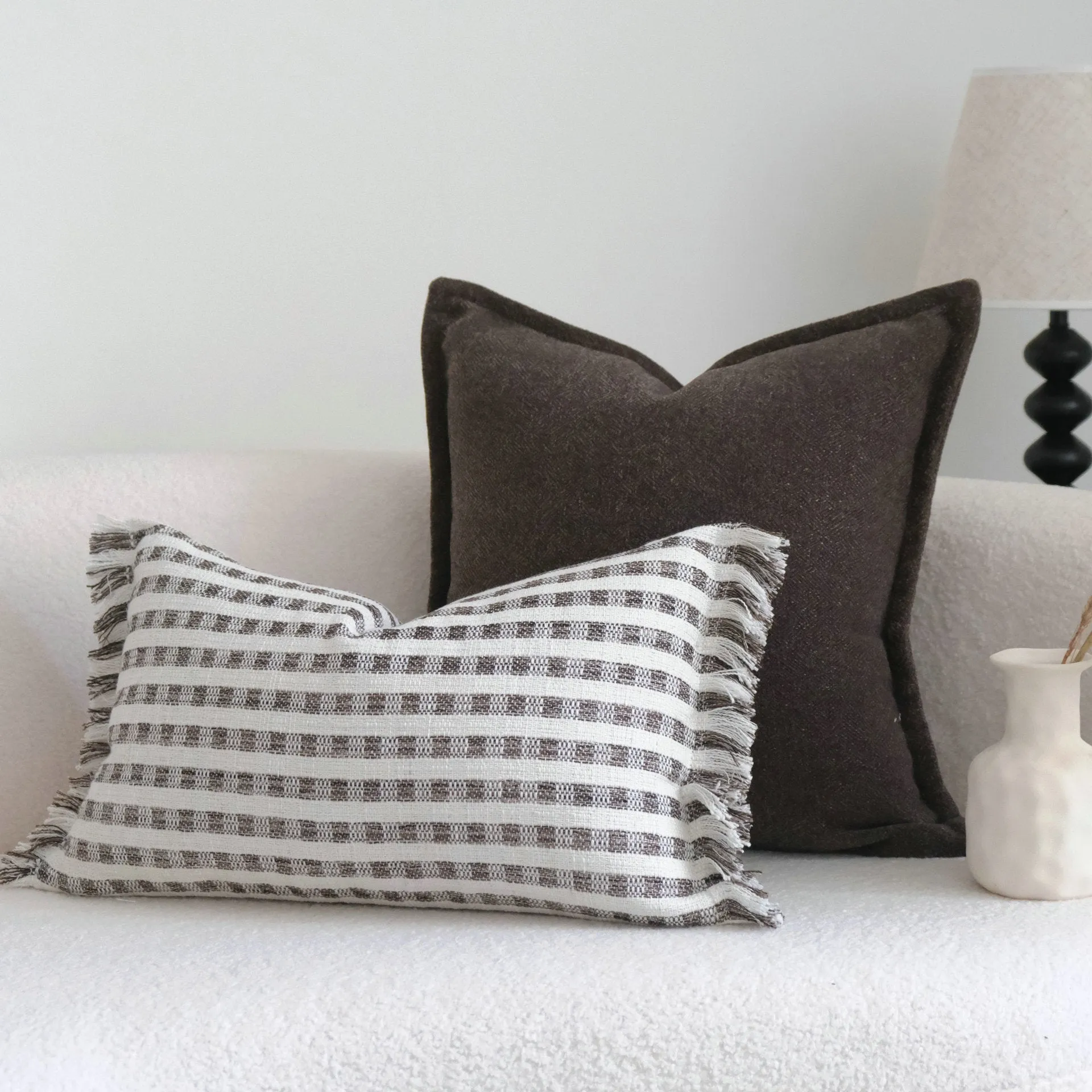 Coffee brown striped mid-century cushion pillow on sofa in square and rectangular sizes