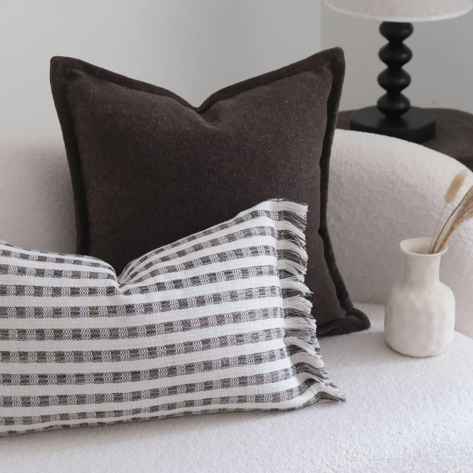 Coffee brown striped mid-century cushion pillow on sofa in square and rectangular sizes