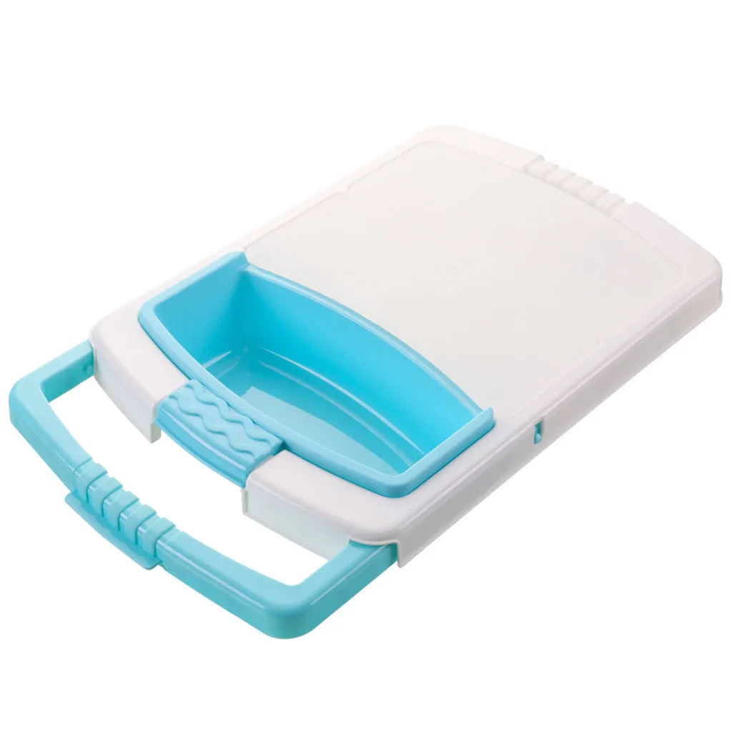 Green multi-function cutting board with drain holes mounted on a kitchen sink edge