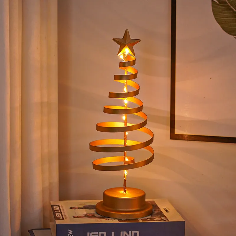 Metal spiral Christmas tree table lamp with warm white LED lights, 33cm tall.