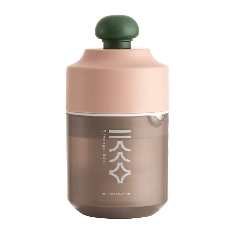 Manual citrus juicer in white, green, or pink with 400ml capacity and compact 180mm x 90mm size