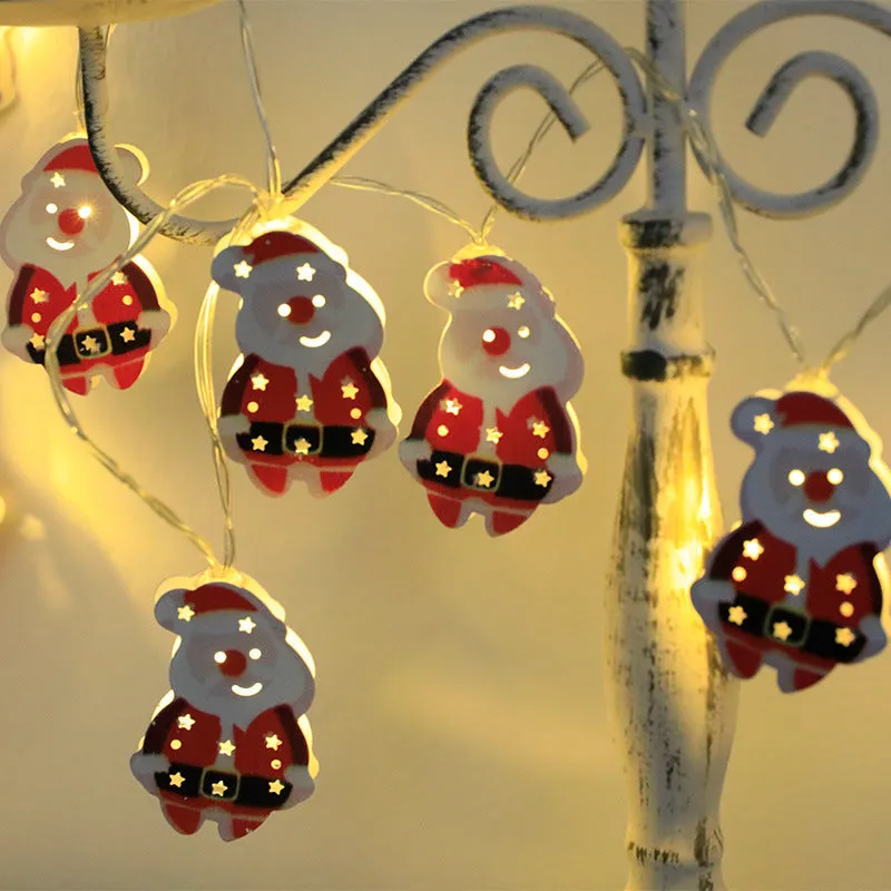 Christmas LED string lights with Santa Claus, reindeer and snowman ornaments hanging on Christmas tree