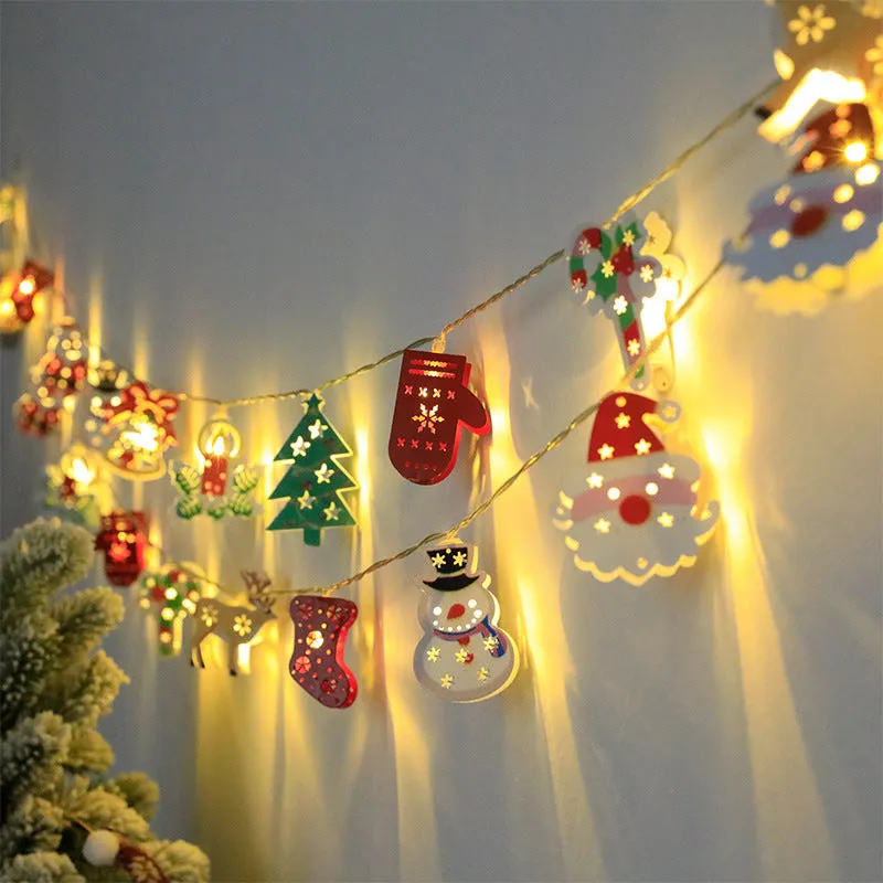 Christmas LED string lights with Santa Claus, reindeer and snowman ornaments hanging on Christmas tree