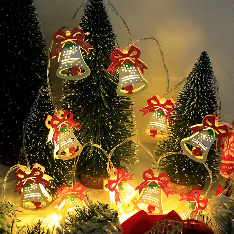 Christmas LED string lights with Santa Claus, reindeer and snowman ornaments hanging on Christmas tree