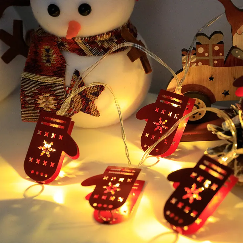 Christmas LED string lights with Santa Claus, reindeer and snowman ornaments hanging on Christmas tree