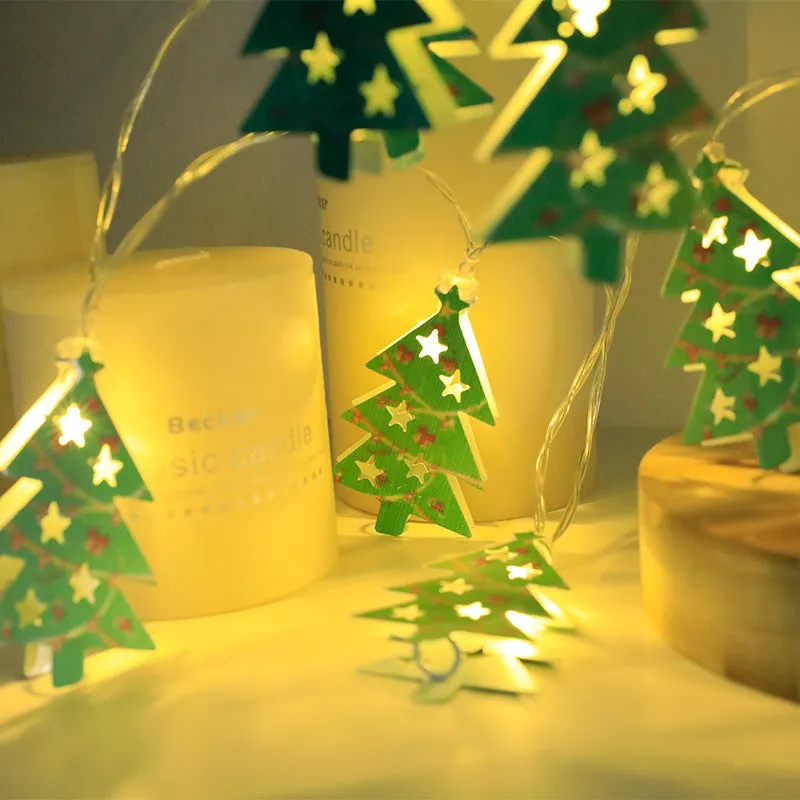 Christmas LED string lights with Santa Claus, reindeer and snowman ornaments hanging on Christmas tree