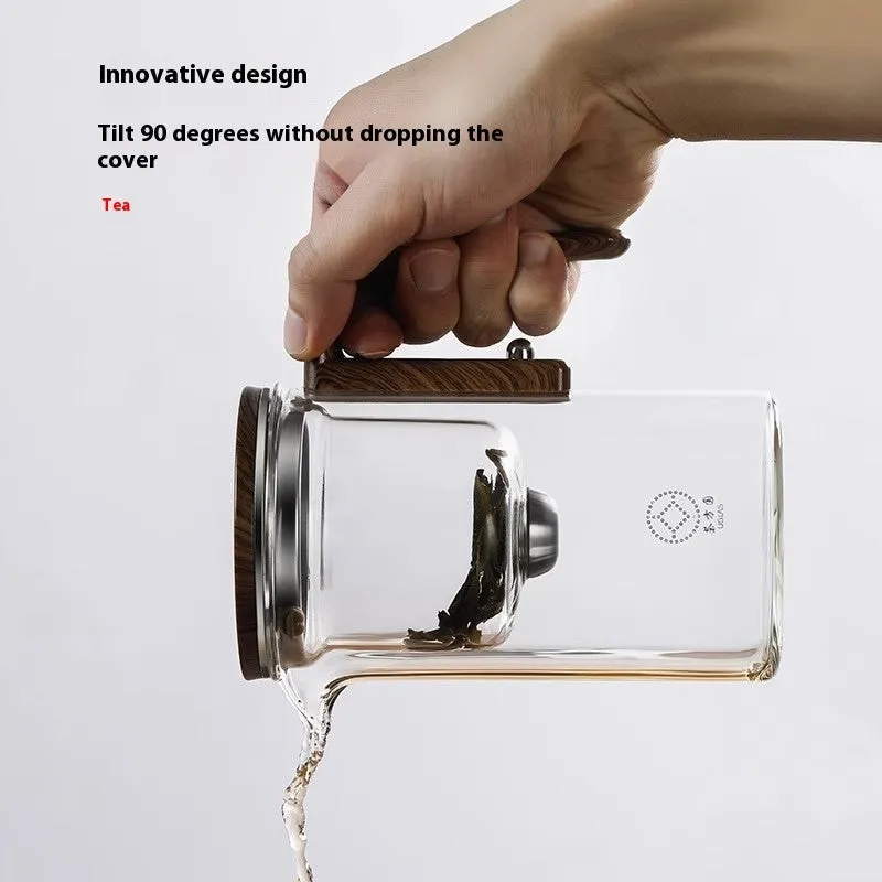 Glass tea pot with magnetic separation button, walnut wood handle, and Chinese style design