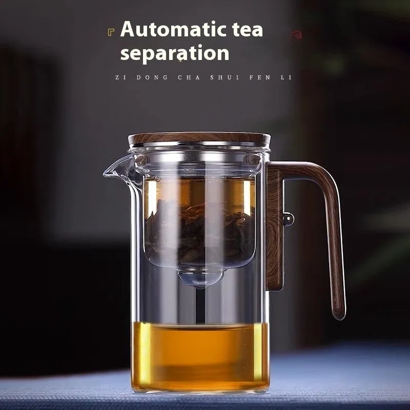 Glass tea pot with magnetic separation button, walnut wood handle, and Chinese style design