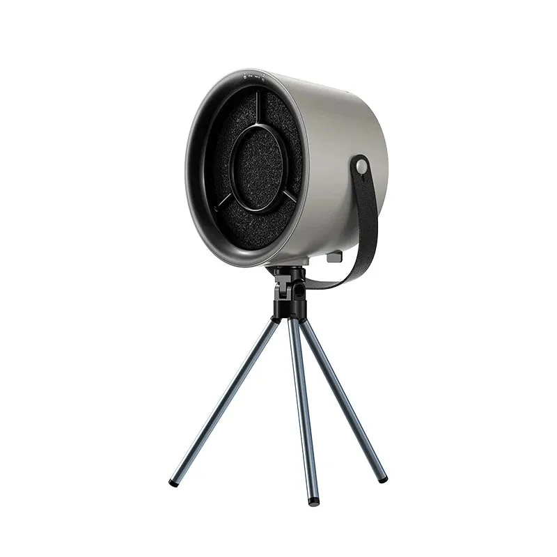 Milk white portable desktop exhaust fan with USB cable and removable filter on a kitchen countertop