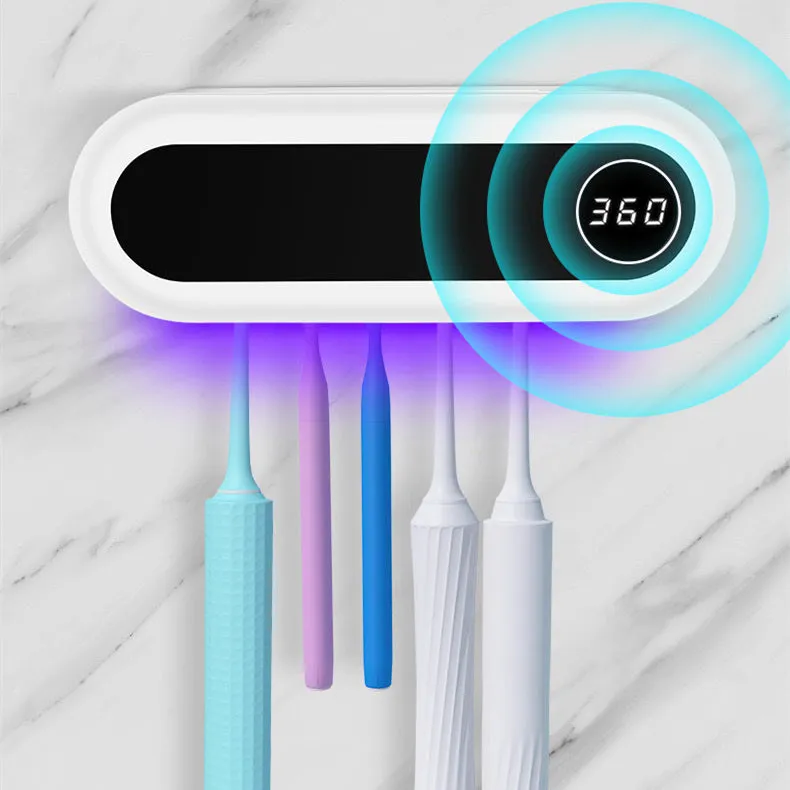 Ivory white wall-mounted UV toothbrush sterilizer holder with digital display showing 360-second timer.