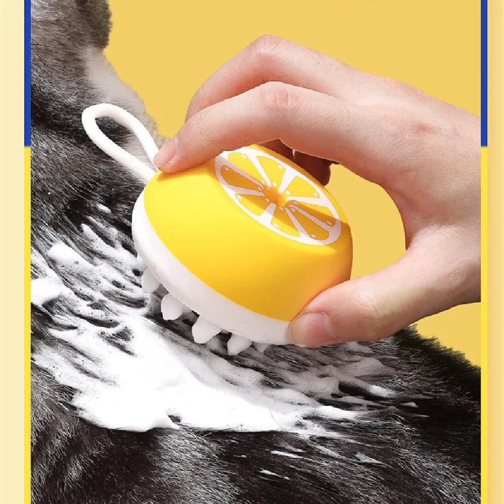 Yellow silicone pet bath brush with massage heads and combed bristles for washing dogs or cats.