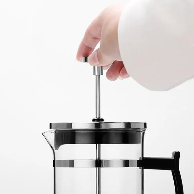 Glass and stainless steel coffee maker with 350ml capacity measuring 10x8x17cm