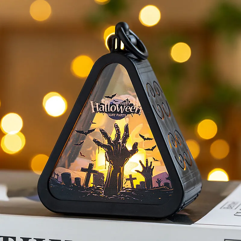 A Halloween decoration pumpkin lamp prop in plastic and glass, showing one of the four colour design options.